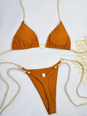 Solid White Bikini Set – Fashionable Lace-Up Design.