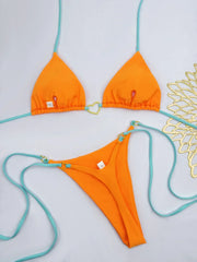 Solid White Bikini Set – Fashionable Lace-Up Design.